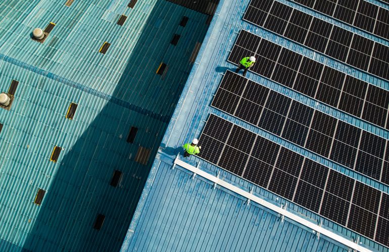 What large estates can learn from NHS decarbonisation challenges. Aerial rooftop solar view