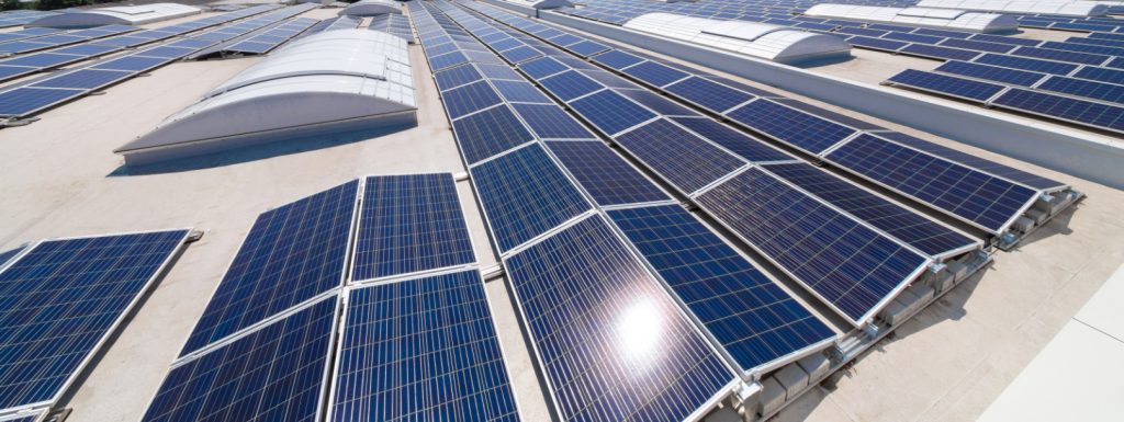 Solar panels installed on the roof of Bentley warehouse by Ortus Energy, harnessing renewable energy for sustainable operations.