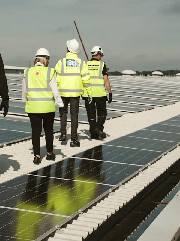 Ortus Energy visit Atlas Copco roof-mounted solar installation.