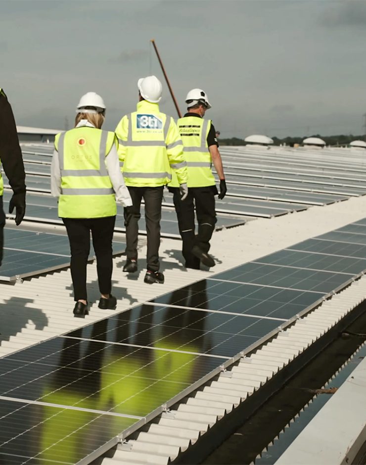 Ortus Energy visit Atlas Copco roof-mounted solar installation.