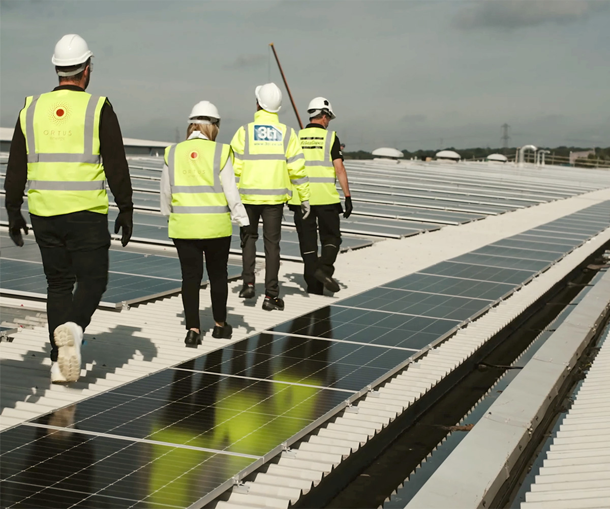 Ortus Energy visit Atlas Copco roof-mounted solar installation.