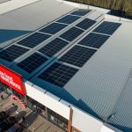 Aerial view of The Food Warehouse Wigan rooftop solar solutions provided by Ortus Energy.
